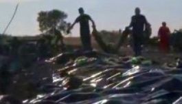 Hazaszállították a Donyecknél lelőtt gép maláj áldozatait