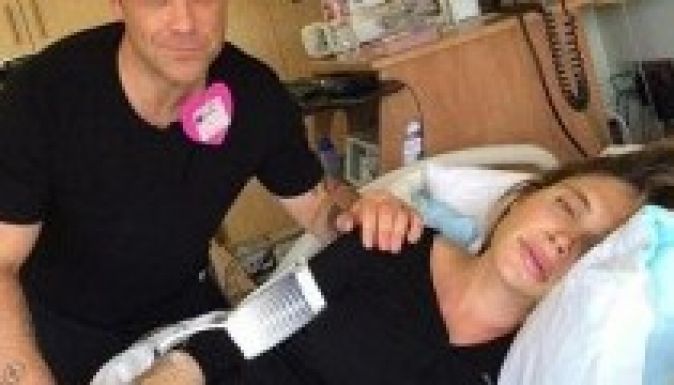 Így enyhítette vajúdó felesége fájdalmait Robbie Williams (VIDEÓ)