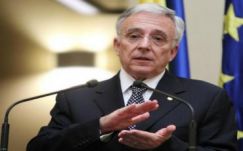 13 601 eurót visz haza havonta Mugur Isărescu 