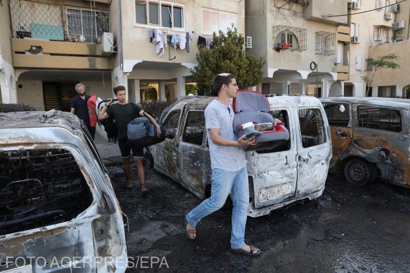 Zsidó lakosok hagyják el otthonaikat Lodban, miután állítólag arabok támadták meg az épületeket az éjjel