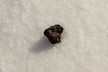 Chebarkul meteorite sample on lake ice